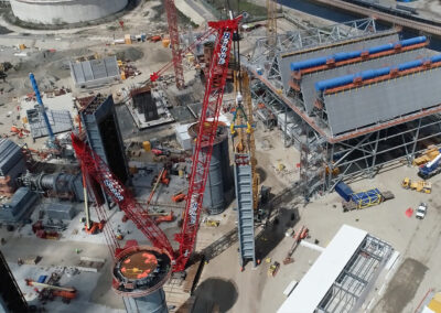construction jobsite photo, a HRSG unit is hoisted by a crane at a California power plant